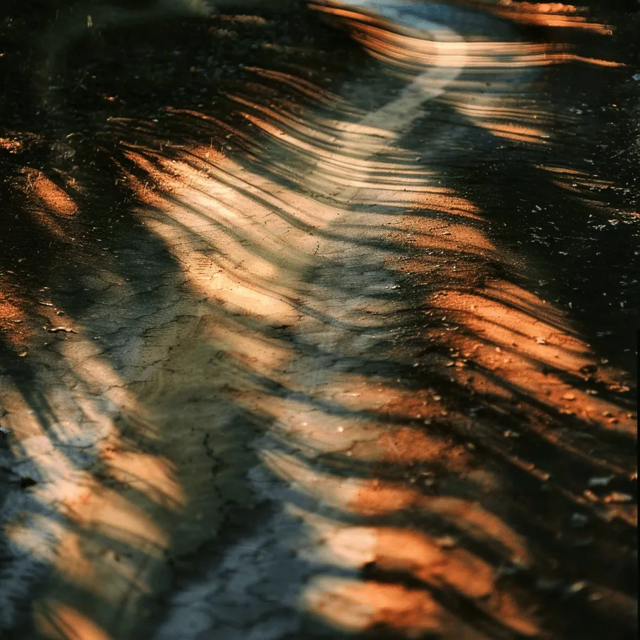 Rippling shadow bands of light and dark across the ground during a total solar eclipse