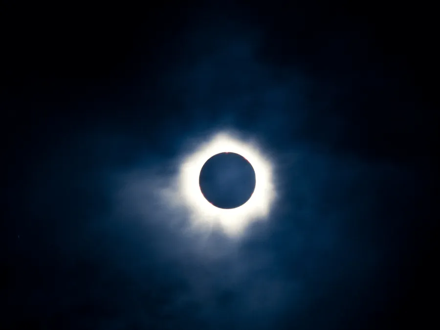 The Sun’s pearly-white corona around the Moon during a total solar eclipse